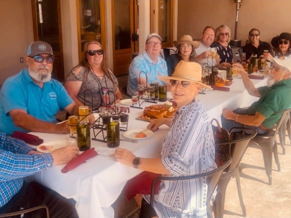 Guests enjoying a winery dinner on a Sonoita Wine Tours excursion